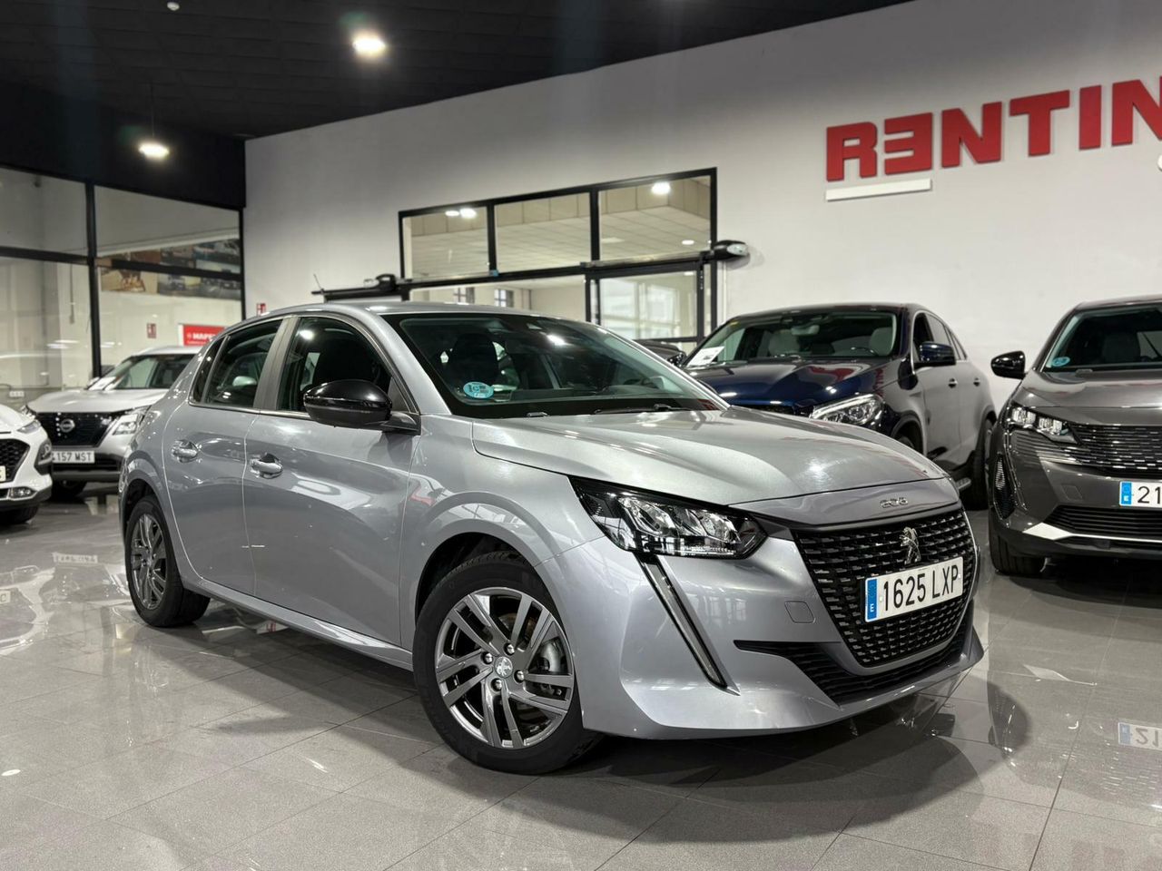 Peugeot 208 ALLURE	73KW (100CV) TAPICERÍA COZY GRIS MÓDENA CON PESPUNTES MENTOLADOS - Foto 2