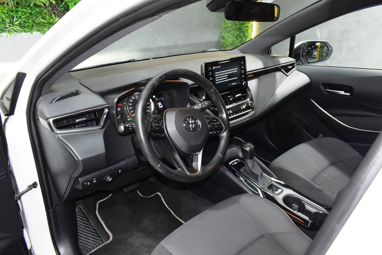 Toyota Corolla 1.8 125H BUSINESS PLUS E-CVT 5P automatica - Foto 21